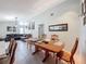 Open-concept dining and living area with lots of space and natural light at 7237 Bramblewood Dr, Port Richey, FL 34668