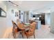 Dining room with tile floors and easy access to kitchen at 7237 Bramblewood Dr, Port Richey, FL 34668