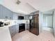 Updated kitchen featuring stainless steel appliances and modern cabinetry at 7237 Bramblewood Dr, Port Richey, FL 34668