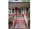 Close-up of the front steps, porch, and front door at 7807 N Mulberry St, Tampa, FL 33604