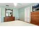 Bright bedroom featuring a dresser, and serene decor, creating a relaxing and inviting space at 7842 15Th N Way, St Petersburg, FL 33702