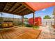 Outdoor patio area featuring a swing, a hammock, and a shed at 8225 Medford Dr, Port Richey, FL 34668