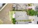 Aerial view of the property showcasing the roof, backyard, and surrounding neighborhood at 8407 Hunters Fork Loop, Ruskin, FL 33573