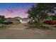 Charming single-story home featuring a brick driveway, two car garage, and well-maintained landscaping at 8407 Hunters Fork Loop, Ruskin, FL 33573