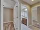 Hallway leading to the bathroom and bedroom at 925 Windton Oak Dr, Ruskin, FL 33570