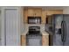 Close up view of the kitchen's appliances and cabinets at 925 Windton Oak Dr, Ruskin, FL 33570