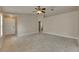Open-concept living room with neutral walls and tile flooring at 925 Windton Oak Dr, Ruskin, FL 33570