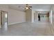 Spacious living room featuring tile flooring and ample natural light at 925 Windton Oak Dr, Ruskin, FL 33570