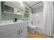 Bathroom featuring a new vanity, faucet, and bath tub with white tiled walls at 9613 River Rd, Spring Hill, FL 34608