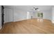 Spacious living room features wood flooring and natural light at 9613 River Rd, Spring Hill, FL 34608