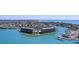 Panoramic aerial view of waterfront condos with beautiful blue waters, beaches, and stunning coastal scenery at 1 Key Capri # 502E, Treasure Island, FL 33706
