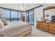 Bedroom featuring a large window and dresser at 1 Key Capri # 502E, Treasure Island, FL 33706