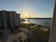 Waterfront community with lush landscaping, waterways, and amenities like a mini golf course and bbq grills at 1 Key Capri # 502E, Treasure Island, FL 33706