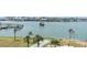 Waterfront condo with shuffleboard court, palm trees, and a marina, near dining and entertainment at 1 Key Capri # 502E, Treasure Island, FL 33706