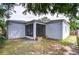 Exterior view of backyard and screened in lanai at 1051 44Th S St, St Petersburg, FL 33711