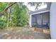 View of backyard and screened in lanai at 1051 44Th S St, St Petersburg, FL 33711