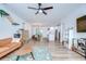 Bright living room showcasing an open floor plan with an eat-in kitchen and modern finishes at 1051 44Th S St, St Petersburg, FL 33711