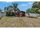 View of an outdoor cabana from the backyard with a covered patio at 10636 Dawns Light Dr, Riverview, FL 33578