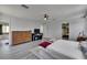 Large bedroom featuring a bedroom suite with a TV and access to a bathroom at 10636 Dawns Light Dr, Riverview, FL 33578