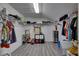 Walk-in closet featuring wire shelving, clothes racks, storage bins, and wood-look flooring at 10636 Dawns Light Dr, Riverview, FL 33578