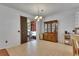 Spacious dining room featuring a sliding glass door and decorative hutch at 10636 Dawns Light Dr, Riverview, FL 33578