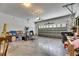 View of garage with open door and storage at 10636 Dawns Light Dr, Riverview, FL 33578