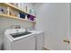 Bright laundry room with a washer and dryer at 10636 Dawns Light Dr, Riverview, FL 33578