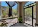 Relaxing screened-in patio with comfortable seating and views of the lush backyard at 10636 Dawns Light Dr, Riverview, FL 33578