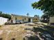 Spacious backyard featuring solar panels, with room for outdoor activities and relaxation at 1101 Alcazar S Way, St Petersburg, FL 33705