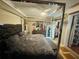 Stylish main bedroom with large bed, dresser, closet and modern decor at 1101 Alcazar S Way, St Petersburg, FL 33705