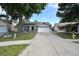 Charming single-story home with a well-manicured lawn, a two-car garage, and a welcoming front porch area at 11314 Silverleaf Ct, Riverview, FL 33579