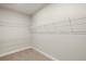 Organized walk-in closet with multiple levels of wire shelving at 11359 Boundless Ter, Venice, FL 34293
