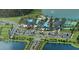 Stunning aerial view of community amenities including pool, clubhouse, tennis courts and lake at 11375 Boundless Ter, Venice, FL 34293