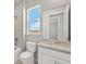 Bright bathroom featuring a tub-shower combination and a single sink vanity with a white cabinet at 11375 Boundless Ter, Venice, FL 34293