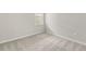 This room boasts soft carpet, neutral walls and a bright window at 11375 Boundless Ter, Venice, FL 34293