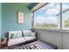 Relaxing balcony with comfortable seating and beautiful nature views at 11404 2Nd N St # 3, St Petersburg, FL 33701