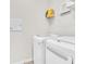 Laundry room features a stacked washer and dryer with overhead shelving at 11626 Blue Woods Dr, Riverview, FL 33569