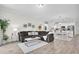 Spacious living room with an open concept floor plan and great natural light at 11626 Blue Woods Dr, Riverview, FL 33569