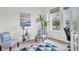 Bright office with large windows and serene decor, ideal for remote work at 11626 Blue Woods Dr, Riverview, FL 33569