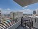 Balcony featuring a table, chairs, and stunning views, perfect for outdoor enjoyment at 1208 E Kennedy Blvd # 914, Tampa, FL 33602