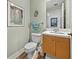 Cozy bathroom featuring a toilet, sink, and decorative accents at 1208 E Kennedy Blvd # 914, Tampa, FL 33602