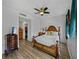 Comfortable bedroom with hardwood floors and abundant natural light at 1208 E Kennedy Blvd # 914, Tampa, FL 33602