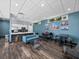 Large community room with a kitchenette, tables, chairs, and comfortable seating for social gatherings and events at 1208 E Kennedy Blvd # 914, Tampa, FL 33602