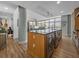 Kitchen featuring a large center island with stainless steel appliances, and hardwood floors at 1208 E Kennedy Blvd # 914, Tampa, FL 33602