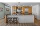 Kitchen with granite countertop island, stainless appliances, and wooden cabinets at 1208 E Kennedy Blvd # 914, Tampa, FL 33602