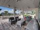 Relaxing outdoor patio area with comfortable seating, dining table, and serene views of the surrounding city at 1208 E Kennedy Blvd # 914, Tampa, FL 33602