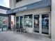 Exterior view of Pour House with patio seating and clear signage at 1208 E Kennedy Blvd # 914, Tampa, FL 33602