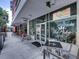 Welcoming storefront for The Poke Company, inviting customers with its modern glass exterior and outdoor seating at 1208 E Kennedy Blvd # 914, Tampa, FL 33602