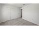 Spacious bedroom featuring a closet, soft carpet, and freshly painted white walls at 1454 Atlas St, Port Charlotte, FL 33952