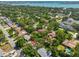 Scenic aerial shot of a residential area featuring tree-lined streets and a glimpse of the waterfront beyond at 1500 Robinson N Dr, St Petersburg, FL 33710
